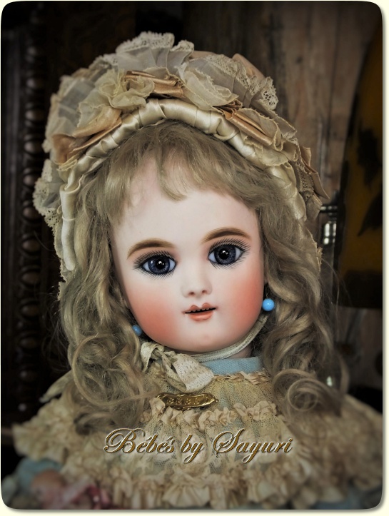 17 inch Eden Bebe with antique eyes